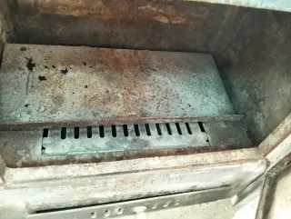 Estufa de leña metálica negra con salida de 150mm