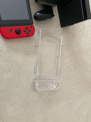 Nintendo Switch + funda Mario Kart + volante