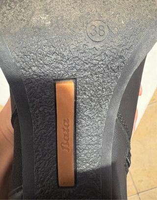 Stivali neri con tacco alto