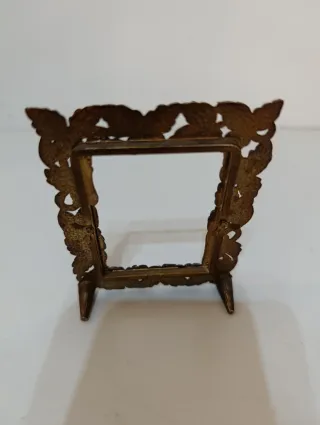 Coppia di antichi portafoto in metallo