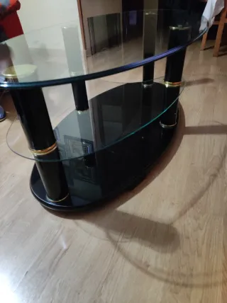 Mesa centro cristal negra ovalada
