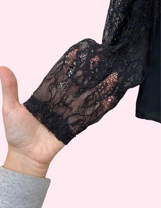 Top manica lunga pizzo nero drappo volant tg L