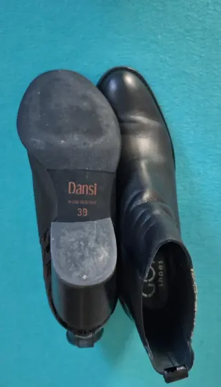 Botines negros con estampado animal