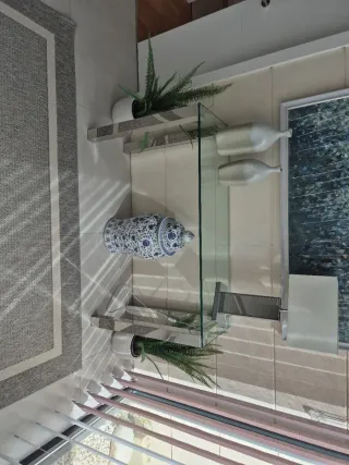 Tavolo da ingresso in cristallo e metallo