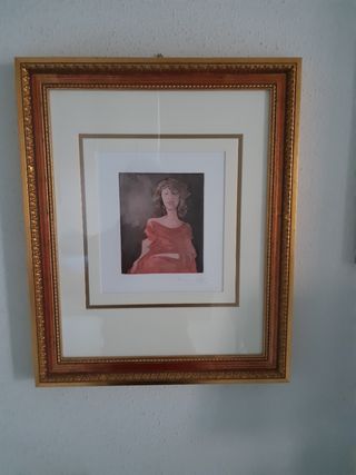 Quadro Fanciulla seduta con cornice dorata
