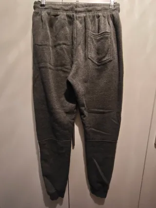 Pantalón chándal gris con cremalleras