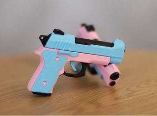 Portachiavi pistola assortiti. Scarrellanti