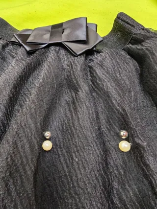 Gonna nera con shorts integrati e perle