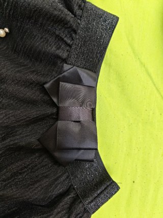 Gonna nera con shorts integrati e perle