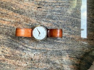 Reloj Tissot.