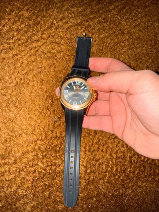 Reloj Marea Negro y Dorado