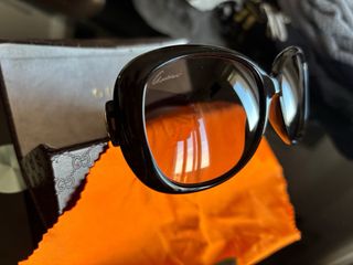 Occhiali da sole Gucci neri e marroni