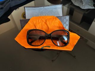 Occhiali da sole Gucci neri e marroni
