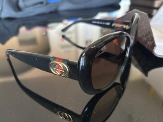 Occhiali da sole Gucci neri e marroni