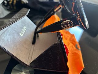 Occhiali da sole Gucci neri e marroni