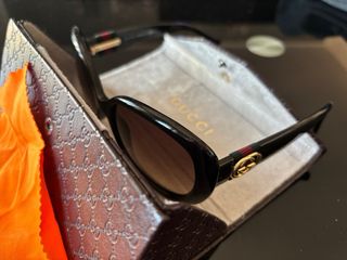 Occhiali da sole Gucci neri e marroni