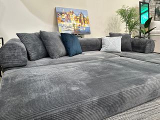 Sofá cama enrollado familiar