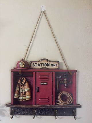 Colgador de pared bombero