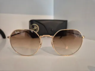 Gafas de sol Ray-Ban doradas y marrones