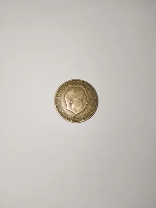 Moneda con error de Franco Caudillo de España 1953