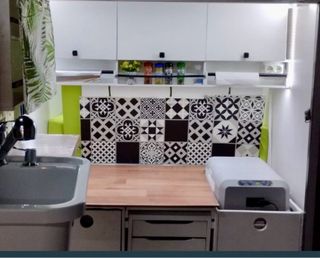 Remolque vivienda con tienda de techo