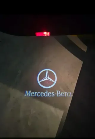 MERCEDES BENZ LUZ CORTESÍA LOGO MERCEDES 2 unids