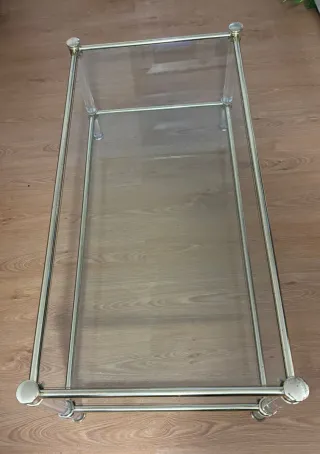 Mesa de centro cristal y metal dorado