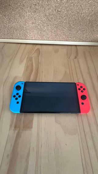 Nintendo Switch OLED con funda y dock