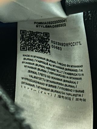 Borsa Guess nera rovinata