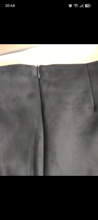 Falda mini negra plisada