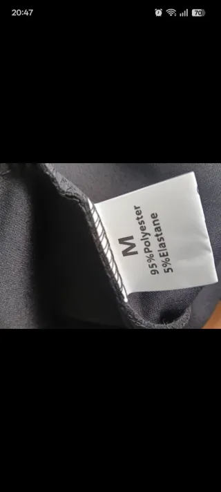 Falda mini negra plisada
