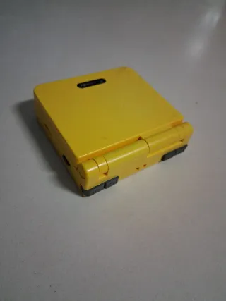 Consola Portátil Amarilla NO FUNCIONA