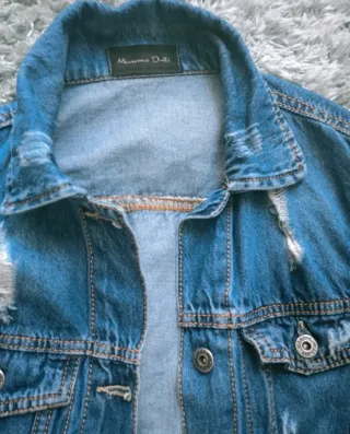 Chaqueta vaquera desgastada