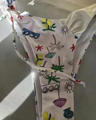 Biquíni estampado palmeiras e guarda-sóis