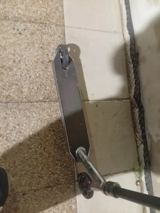 Patinete freestyle plateado