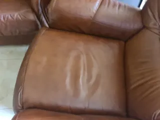 Antiguo tresillo de Sofás de piel de búfalo marron