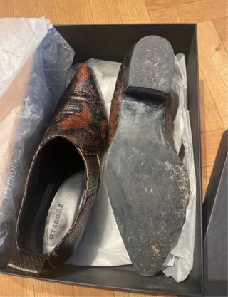 Zapatos de piel UTERQÜE negros y marrones