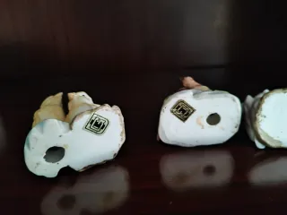 Figuras de aves de porcelana