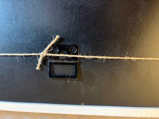 Marco de fotos de madera con cuerdas