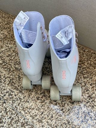Patins 4 rodas Oxelo branco e rosa