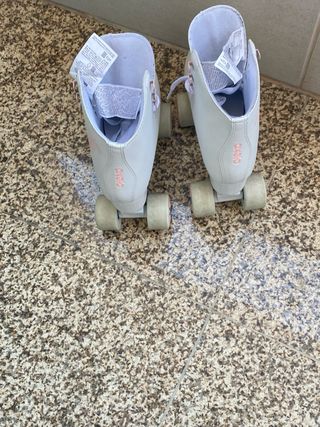 Patins 4 rodas Oxelo branco e rosa