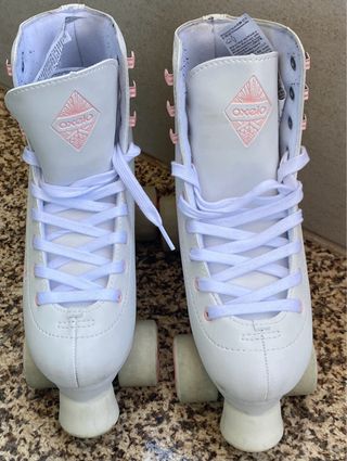 Patins 4 rodas Oxelo branco e rosa