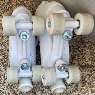Patins 4 rodas Oxelo branco e rosa