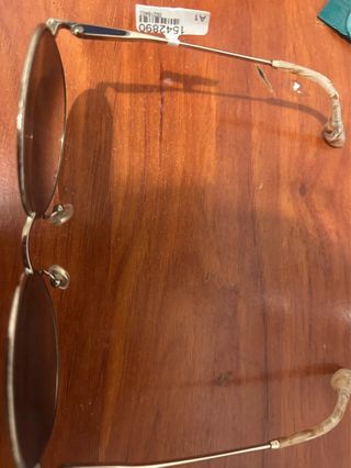 Gafas de sol redondas plateadas y marrones