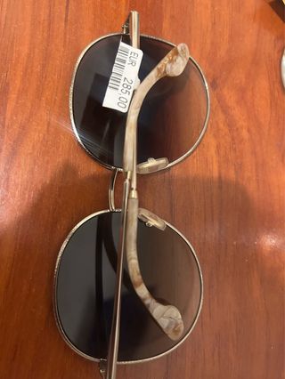 Gafas de sol redondas plateadas y marrones
