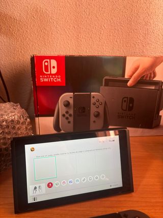 Nintendo Switch + caja original + cargador