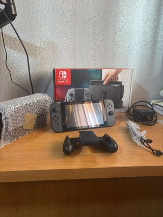 Nintendo Switch + caja original + cargador