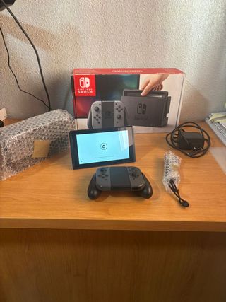 Nintendo Switch + caja original + cargador