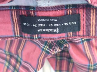 Calças Stradivarius xadrez vermelhas