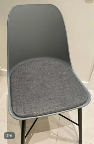 Silla patas metálicas asiento tela.